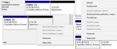Vlevo dole pravý klik na nepřiřazený oddíl vpravo na přiřazený